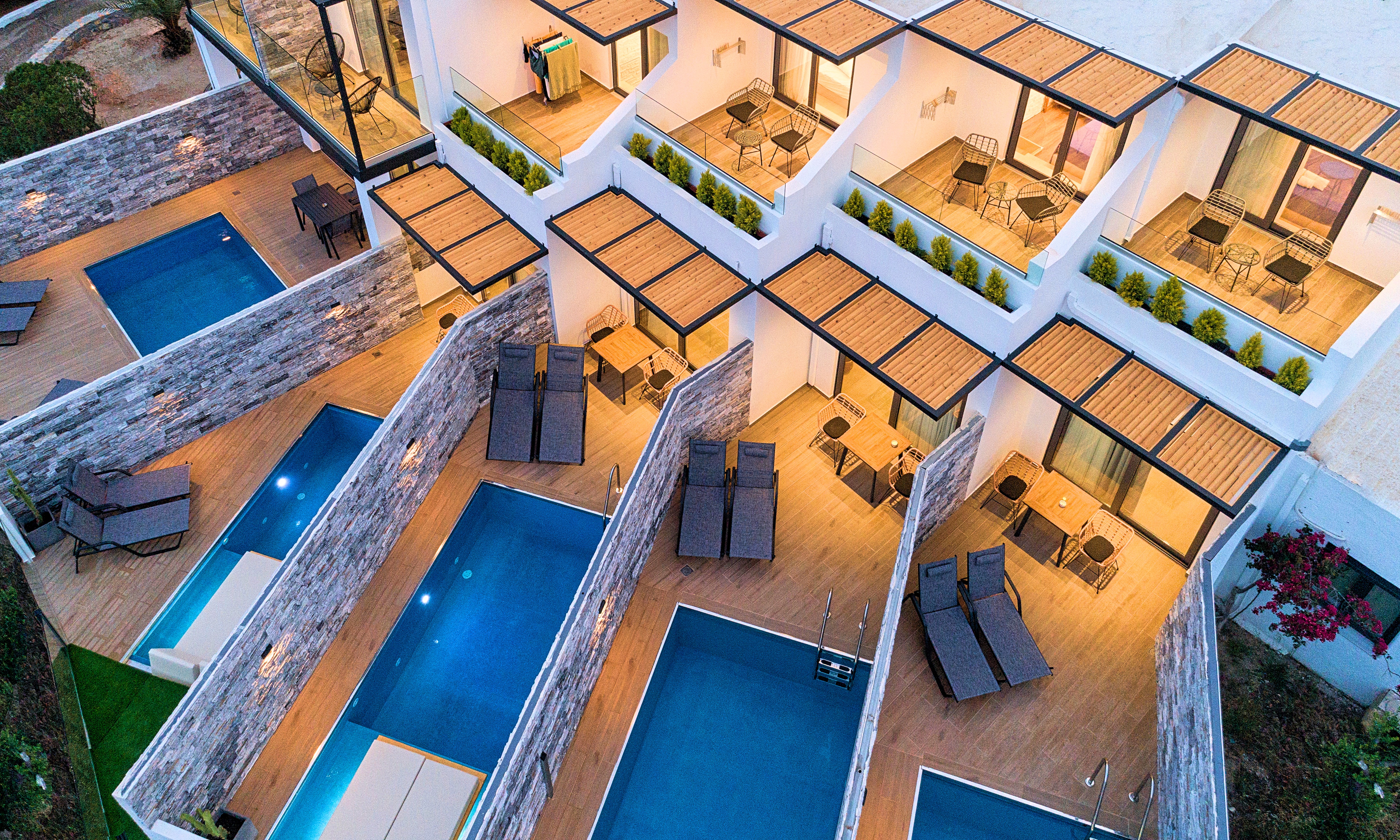 Relaxruimte met ligbedden — Aelia Suites