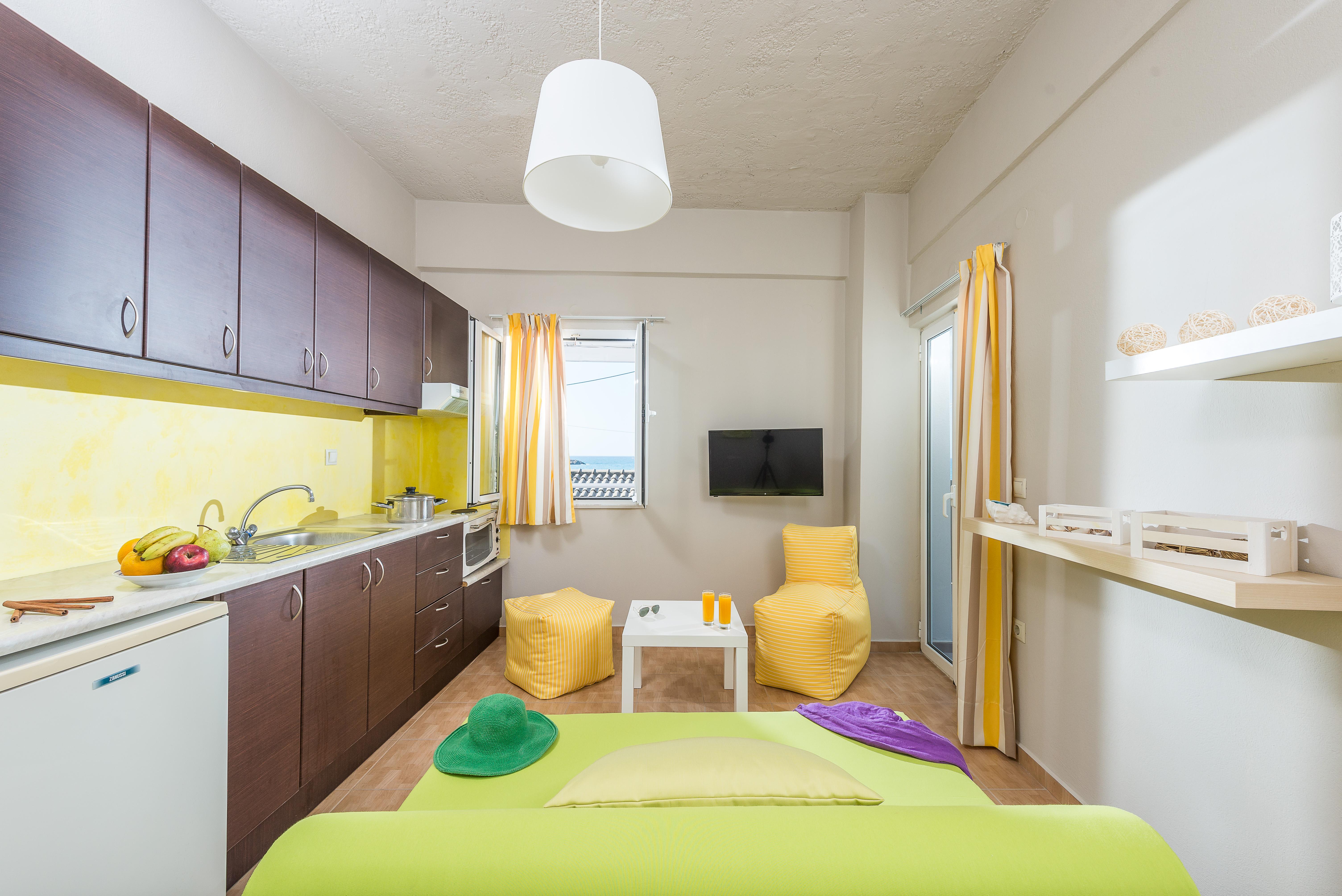 Suite met zithoek — Anemos Suites by Estia