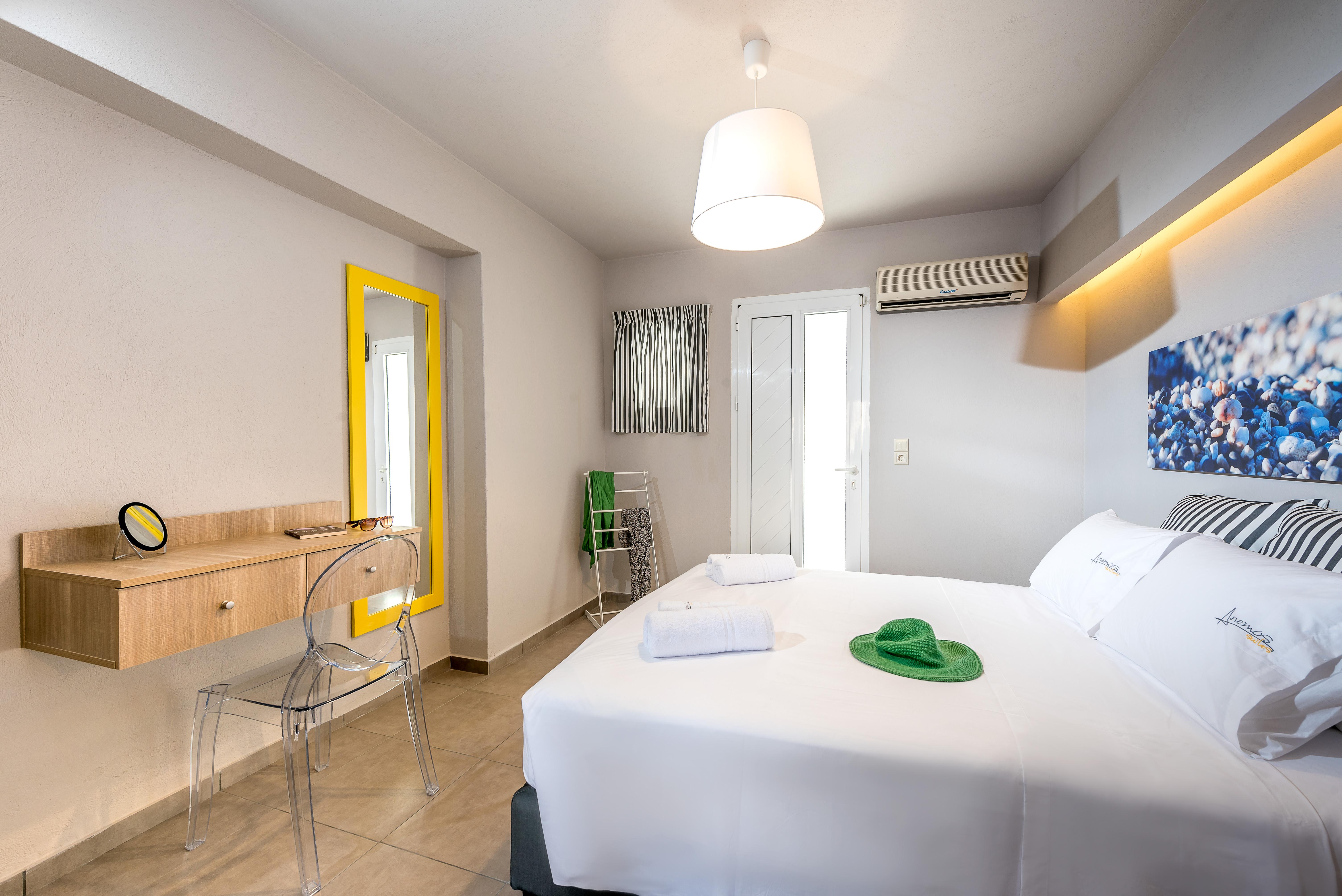 Suite met zithoek — Anemos Suites by Estia