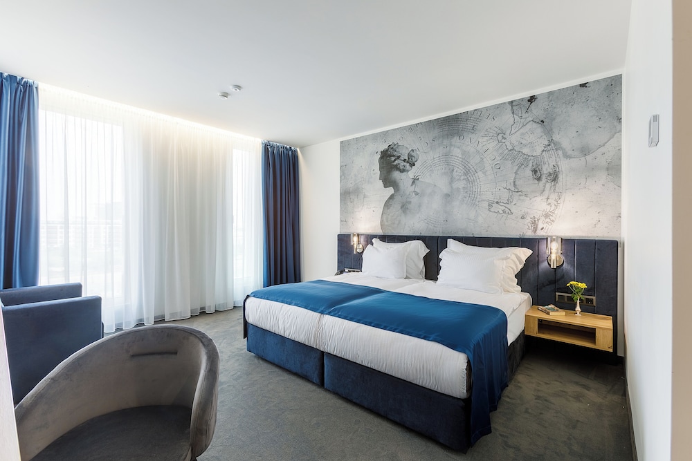 Ruim hotelkamers met toegang tot balkon of terras