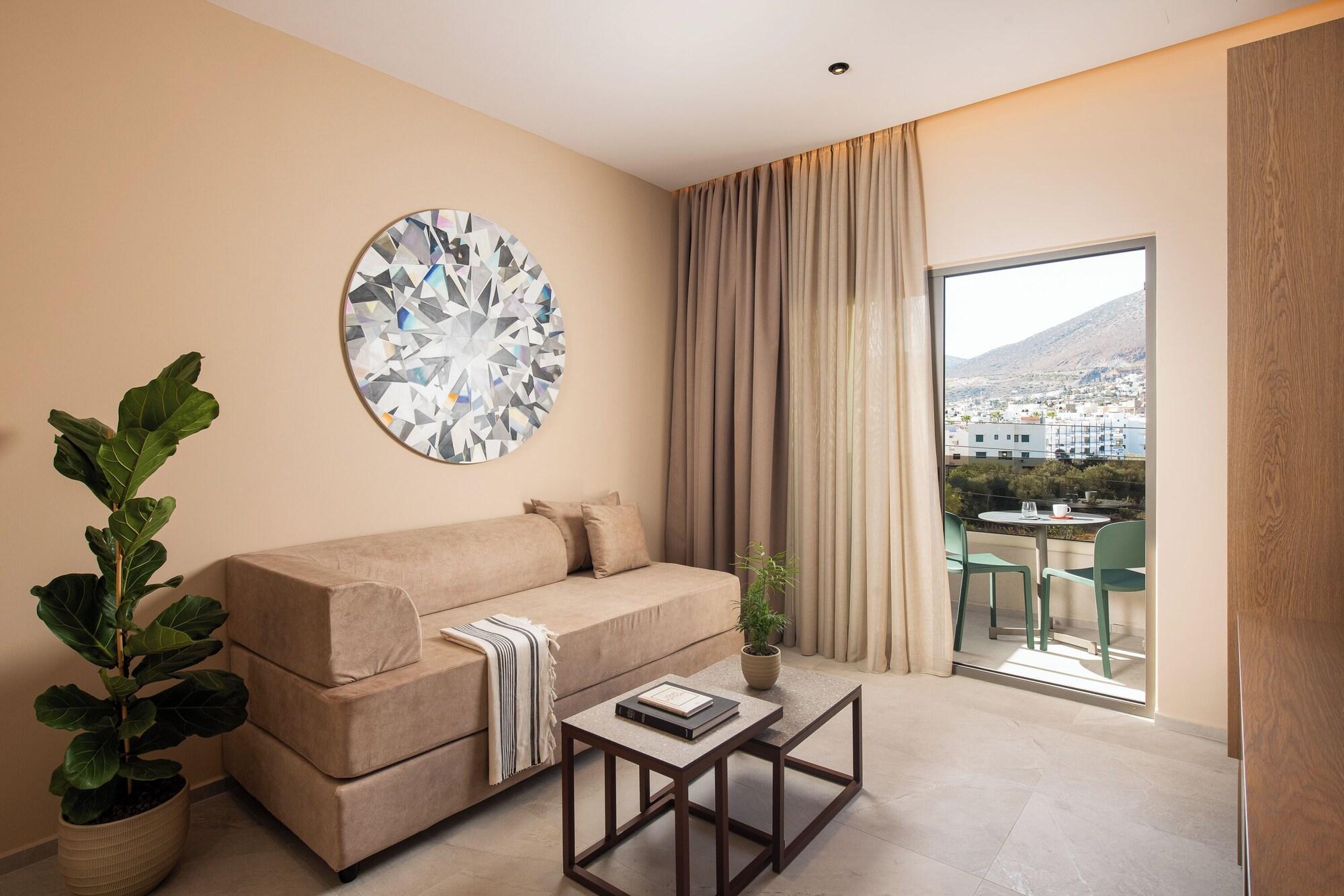 Suite met zithoek — Cosmeen Lifestyle Boutique Stay