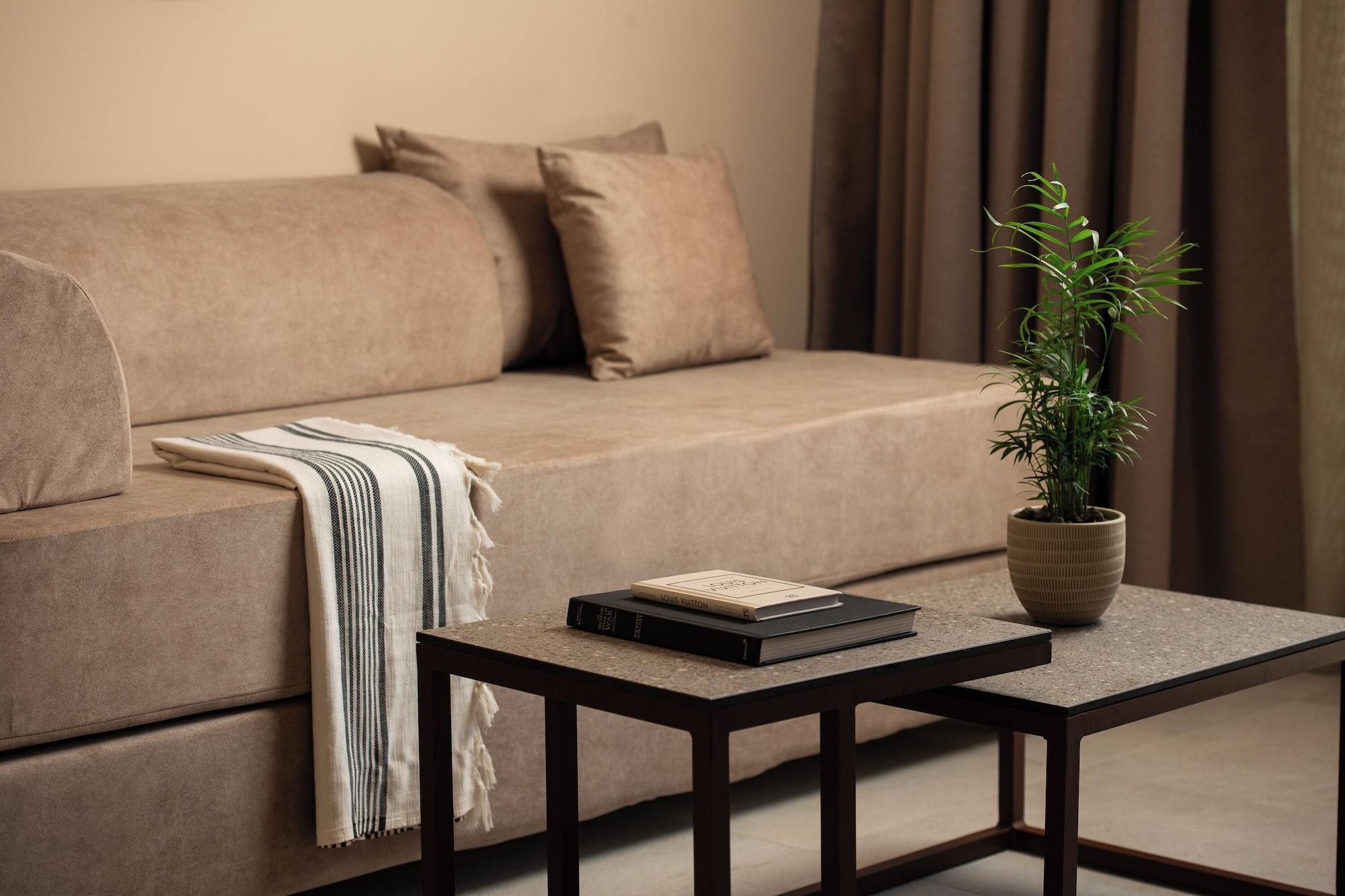 Suite met zithoek — Cosmeen Lifestyle Boutique Stay