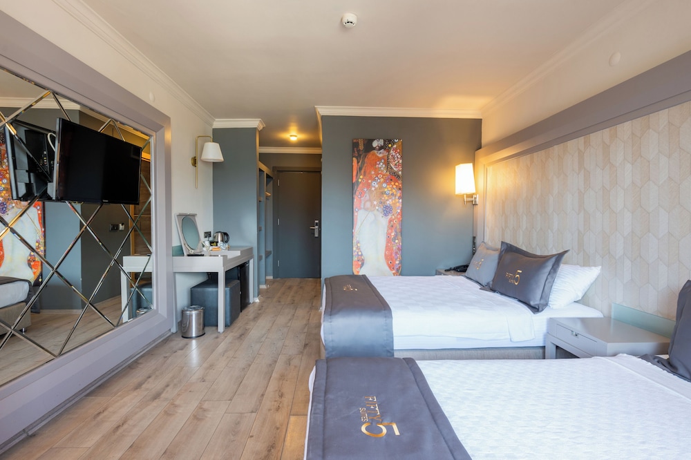 Luxe hotelkamer Fifty Five Suite met kingsize bed