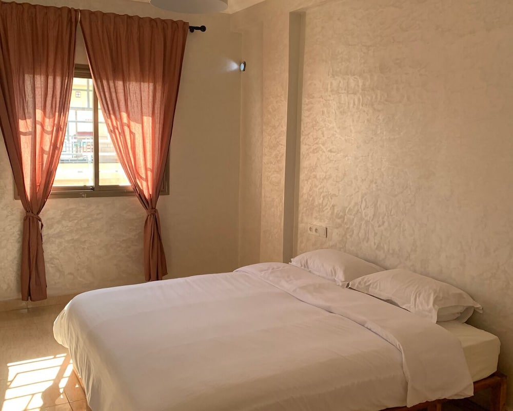 Ruime gastenkamer Locanda Residence Massira