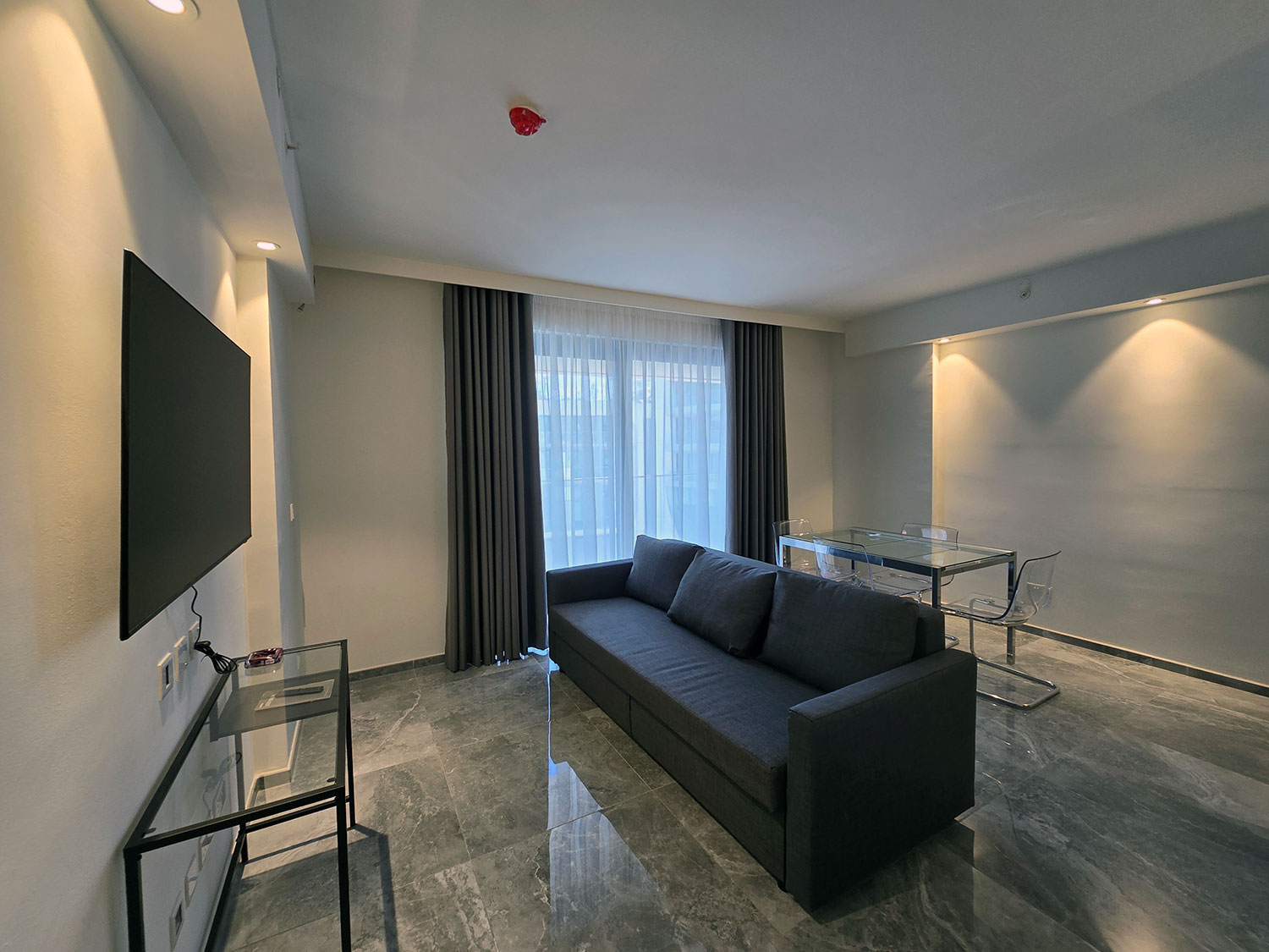 Suite met zithoek — Mercury Suites - Skydream Getaways