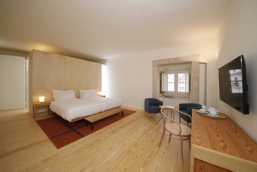 Gastenkamer met uitzicht op het kloostercomplex