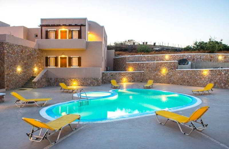 Zonsondergang vanaf Moonlight Apartments Santorini over water