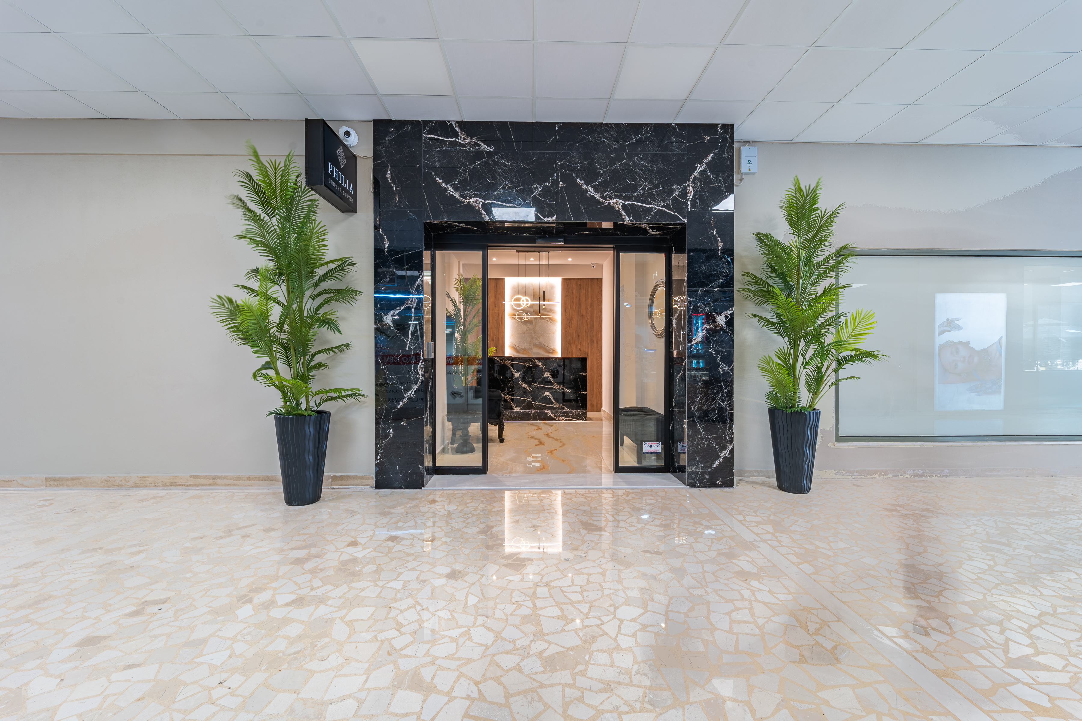 Lobby met receptie — Philia Center Suites