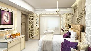 Eigentijdse hotelkamer met werk- en zithoek Planet Hollywood Cancun Cancun