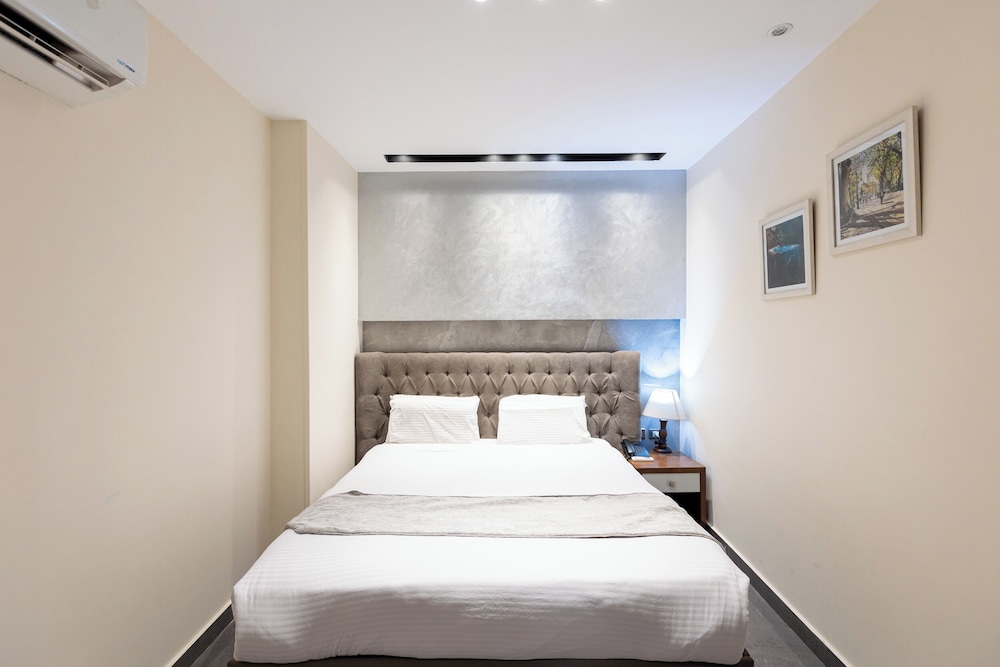 Gezellige kamer met zithoek in Pyramids Yard