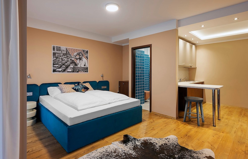 Gezellige gastenkamer met stedelijk design