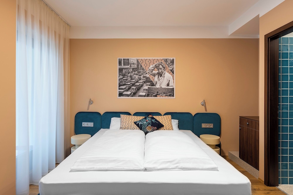 Sfeervolle hotelkamer met quality beddengoed