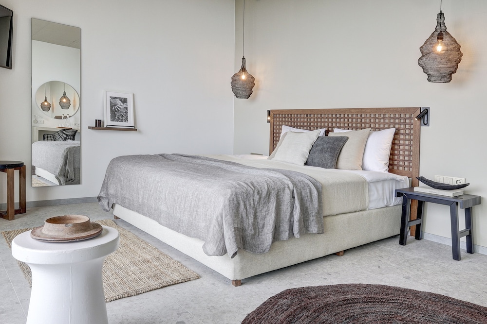 Slaapkamer met zeezicht in Umani Hotel & Beach