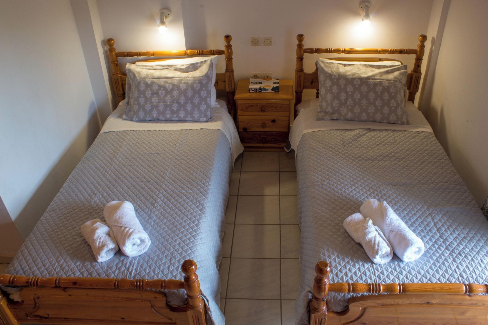 Kamer met twee aparte bedden — Vaso Studios