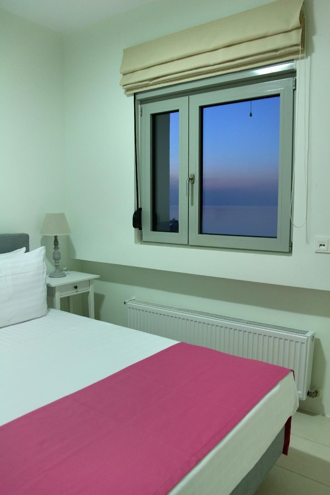 Strand bij zonsondergang — Vivian Art Apartments
