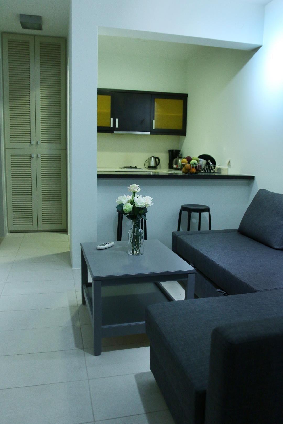 Suite met zithoek — Vivian Art Apartments