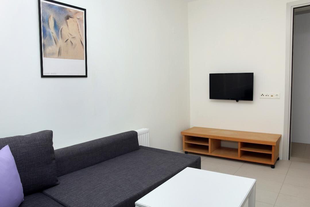 Suite met zithoek — Vivian Art Apartments