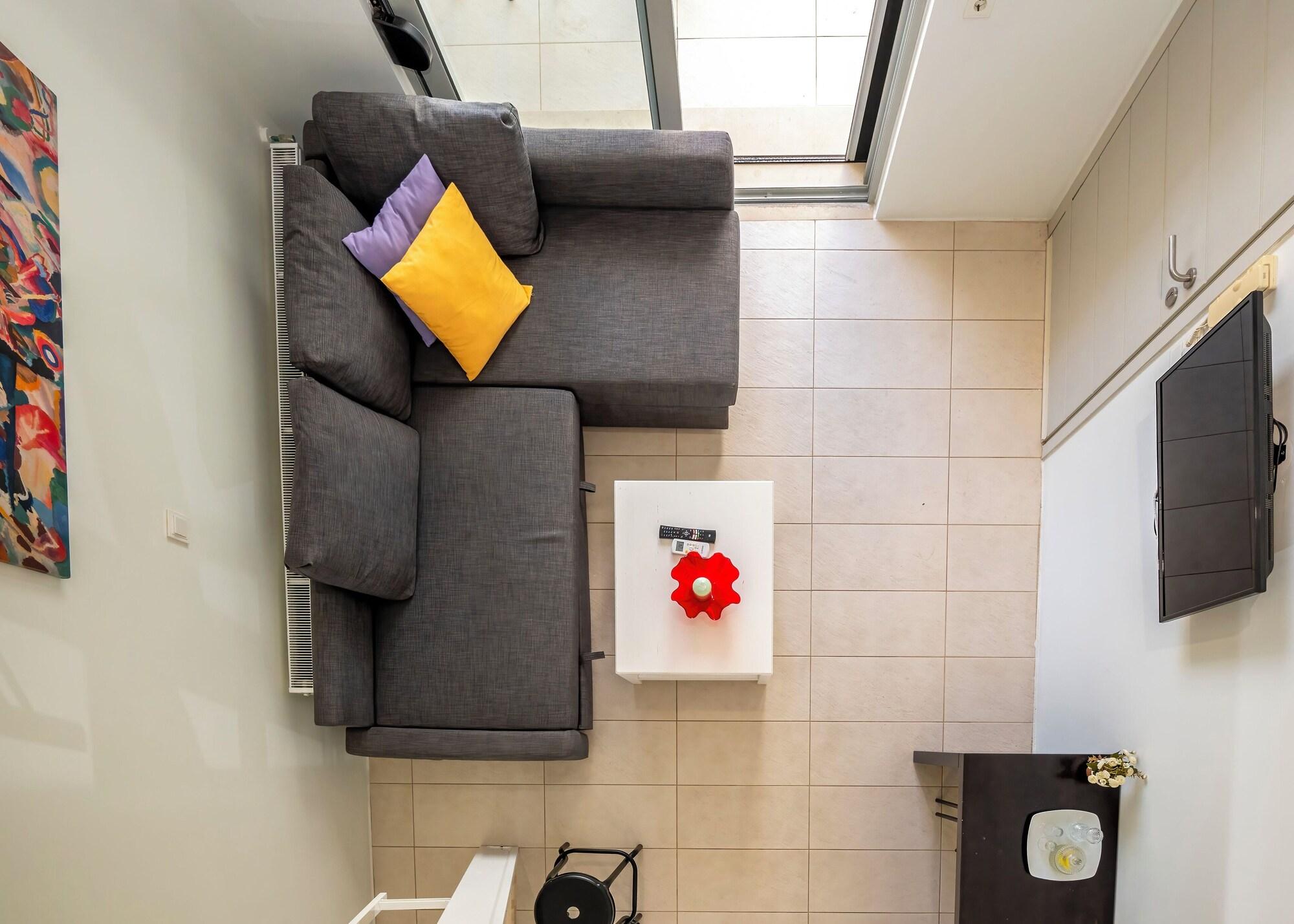Suite met zithoek — Vivian Art Apartments